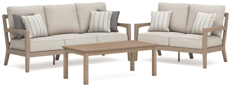 Hallow Creek Outdoor Sofa and Loveseat with Coffee Table in Driftwood - PKG021264