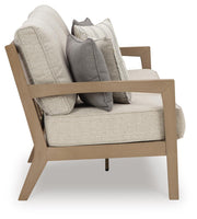 Hallow Creek Outdoor Sofa and Loveseat with Coffee Table in Driftwood - PKG021264