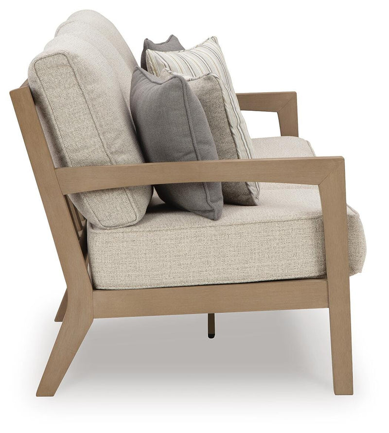 Hallow Creek Outdoor Sofa and Loveseat with Coffee Table in Driftwood - PKG021264