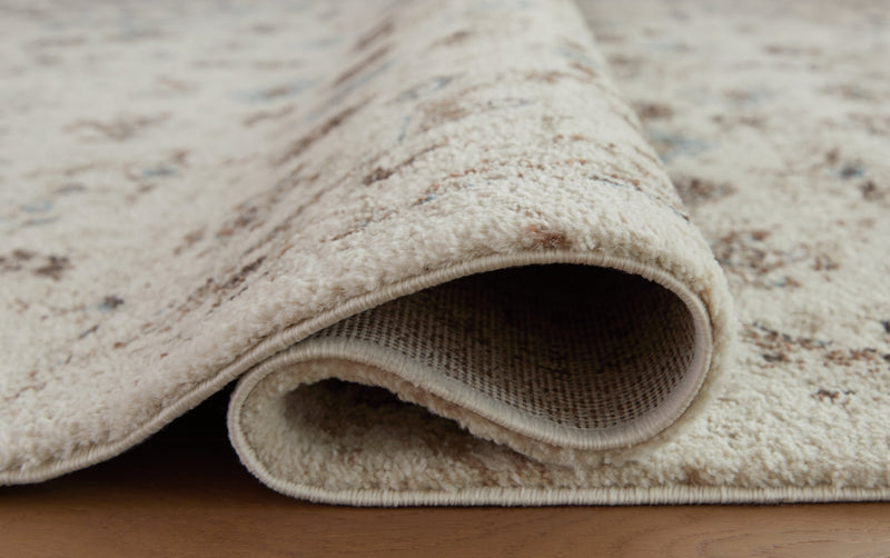 Jossler Ivory/Brown/Teal Large Rug - R407071