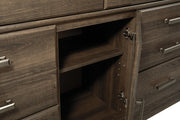 Juararo Dark Brown King Poster Bed, Dresser, Chest and Nightstand - B251B35