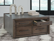 Kallenny Brown/Gray Coffee Table - T669-8