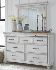 Kanwyn Whitewash Cal King Upholstered Panel Bed, Dresser, Mirror and Chest - B777B23