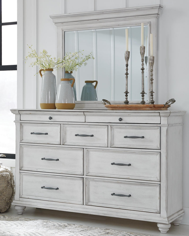 Kanwyn Whitewash Cal King Upholstered Panel Bed, Dresser, Mirror and Chest - B777B23
