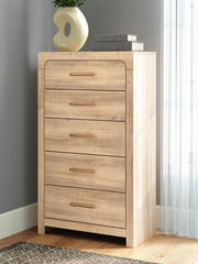 Kinlanni Queen Upholstered Panel Bed, Dresser and Chest in Tan - PKG023886