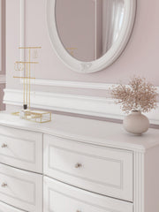 Kozlani Full Upholstered Panel Storage Bed and Dresser in White - PKG023810