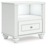 Kozlani Twin Upholstered Panel Bed, Dresser and Nightstand in White - PKG023798