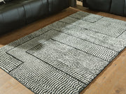 Kurtmen Black/Ivory 5' x 7' Area Rug - R407592