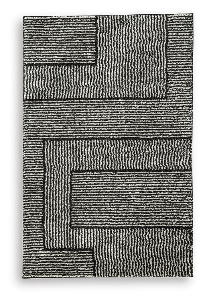 Kurtmen Black/Ivory 5' x 7' Area Rug - R407592