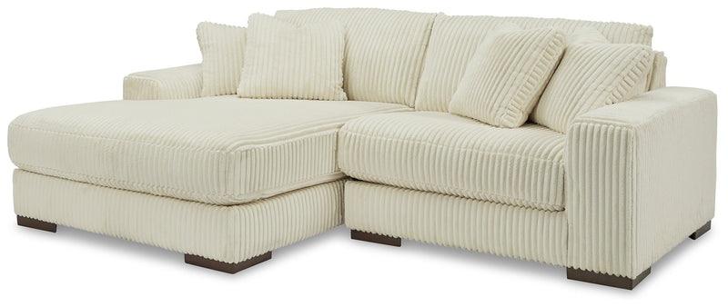 Lindyn 2-Piece Sectional with Ottoman in Ivory - PKG014502
