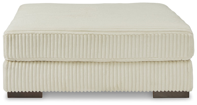Lindyn 4-Piece Sectional with Ottoman in Ivory - PKG016106