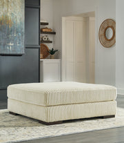 Lindyn 4-Piece Sectional with Ottoman in Ivory - PKG016106