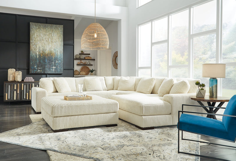 Lindyn 5-Piece Sectional with Ottoman in Ivory - PKG014506