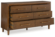 Lyncott King Upholstered Bed with Dresser in Brown - PKG018771