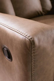 Mackmenville Reclining Sofa and Reclining Loveseat with Console in Caramel - PKG024855