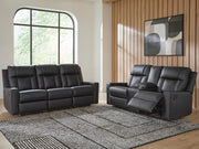 Mackmenville Reclining Sofa and Reclining Loveseat with Console in Carbon - PKG024853