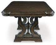 Maylee Dining Table and 10 Chairs with Storage in Dark Brown from Ashley - Luna Furniture