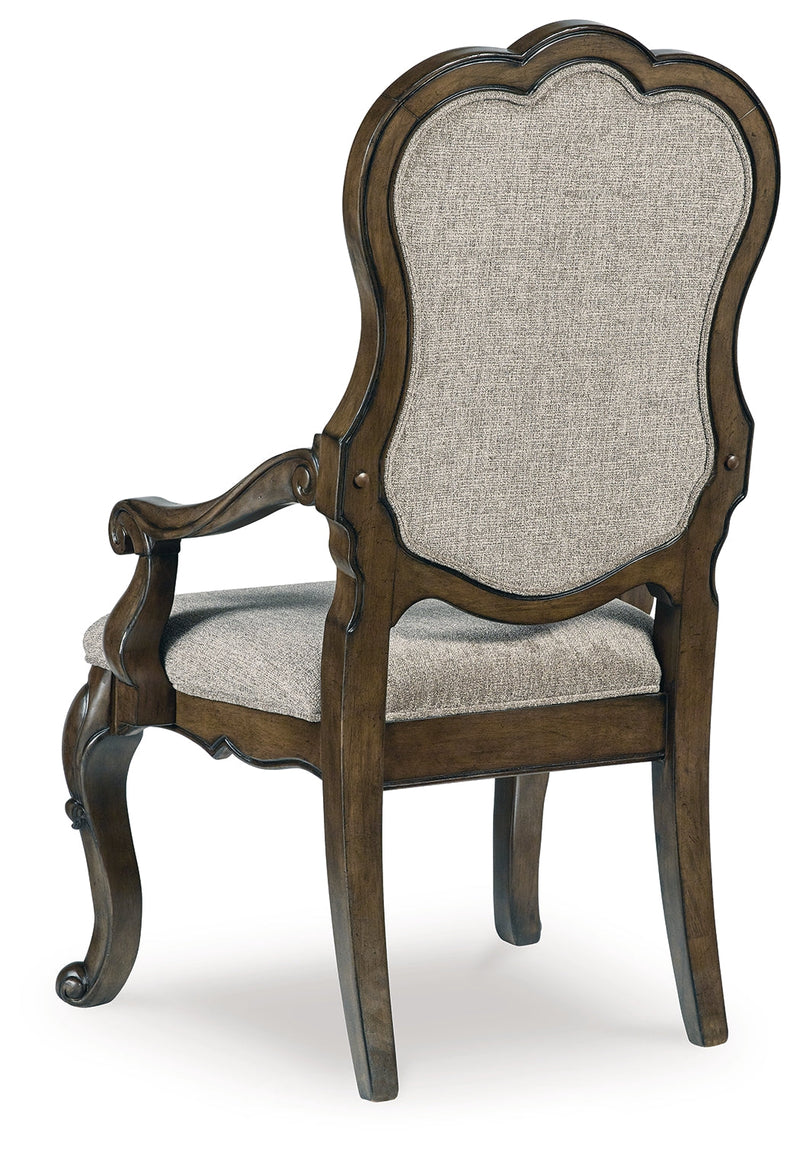 Maylee Dining Table and 10 Chairs with Storage in Dark Brown from Ashley - Luna Furniture