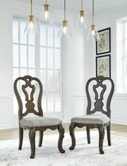 Maylee Dining Table and 10 Chairs with Storage in Dark Brown from Ashley - Luna Furniture