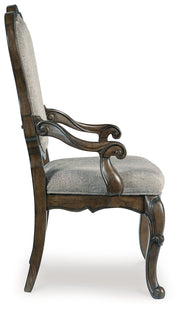 Maylee Dining Table and 10 Chairs with Storage in Dark Brown from Ashley - Luna Furniture