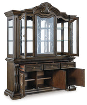 Maylee Dining Table and 8 Chairs with Storage in Dark Brown from Ashley - Luna Furniture