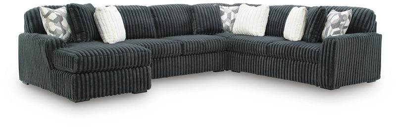 Midnight-Madness 4-Piece Sectional and Ottoman - 98105U5