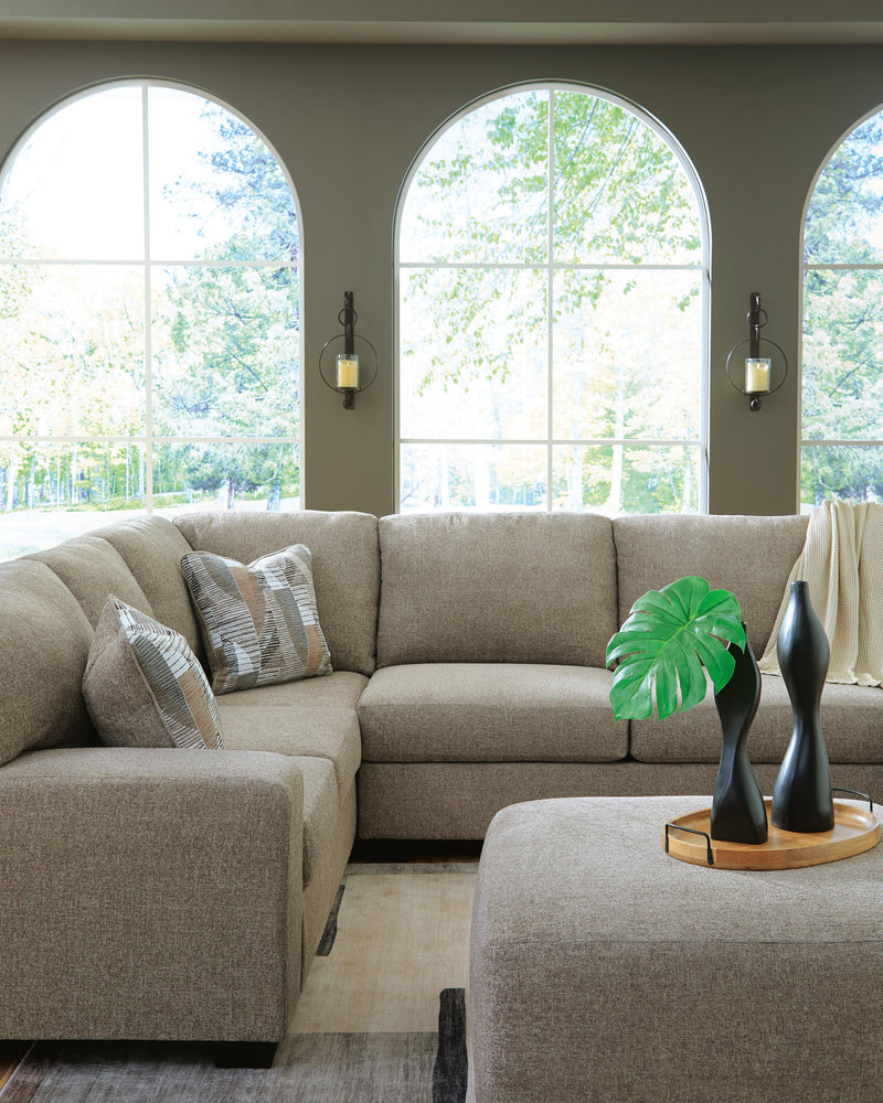Newellen 3-Piece Sectional and Oversized Ottoman - 48404U1