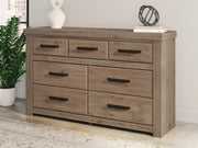 Oliandon Queen Panel Storage Bed and Dresser in Light Brown - PKG025178