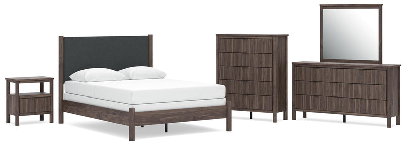 Pamytta Queen Upholstered Panel Bed, Dresser, Mirror, Chest and Nightstand in Brown - PKG022732