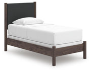 Pamytta Twin Upholstered Panel Bed and Dresser in Brown - PKG022721
