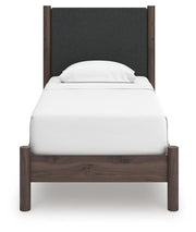 Pamytta Twin Upholstered Panel Platform Bed, Dresser and Nightstand in Brown - PKG022686