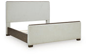 Radkin Burnished Brown Queen Upholstered Panel Bed - PCB843B2