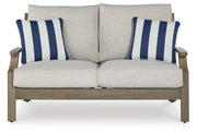 Rainier Ranch Outdoor Loveseat and 2 Chairs with Coffee Table in Brown/Beige from Ashley - Luna Furniture