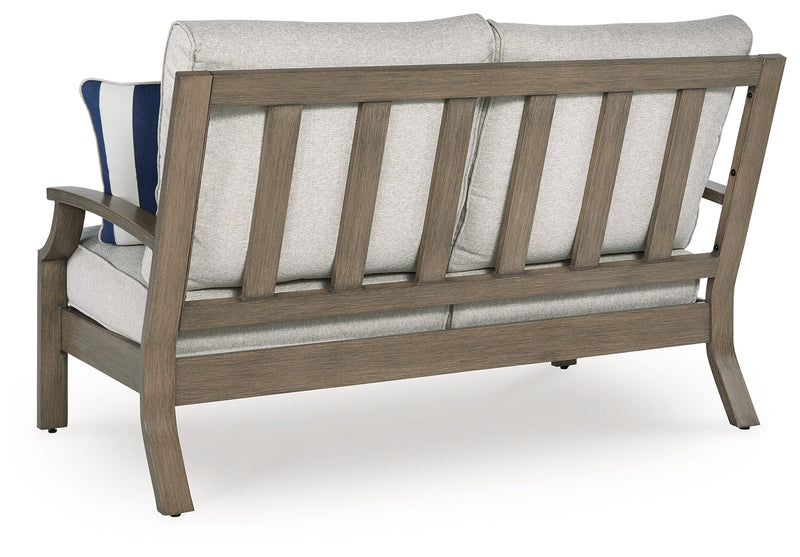 Rainier Ranch Outdoor Loveseat and 2 Chairs with Coffee Table in Brown/Beige from Ashley - Luna Furniture