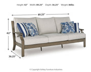 Rainier Ranch Outdoor Sofa and 2 Chairs with Coffee Table in Brown/Beige from Ashley - Luna Furniture