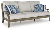 Rainier Ranch Outdoor Sofa and Loveseat with Coffee Table in Brown/Beige from Ashley - Luna Furniture