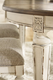 Realyn Chipped White Oval/Round Dining Table and 6 Ribbon Back Chairs from Ashley - Luna Furniture