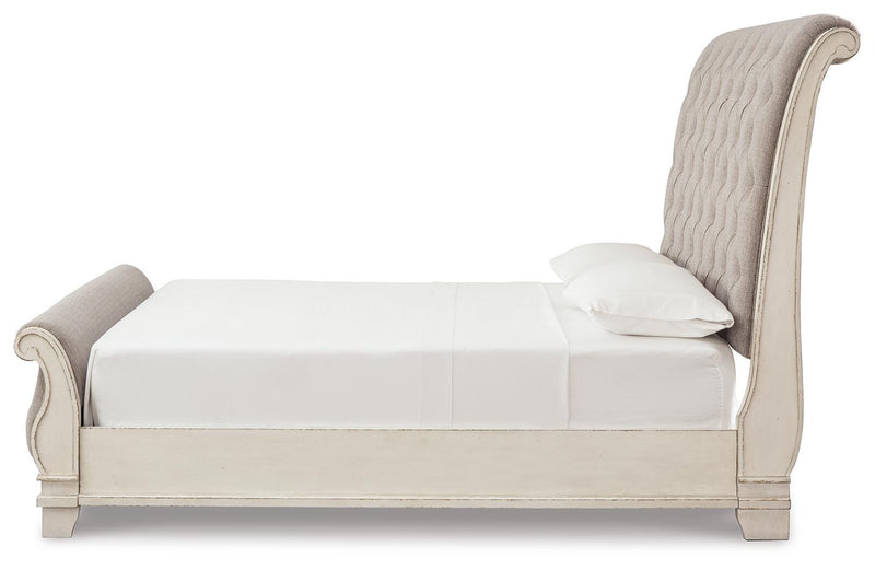 Realyn Two-tone Queen Upholstered Sleigh Bed and Chest - B743B29