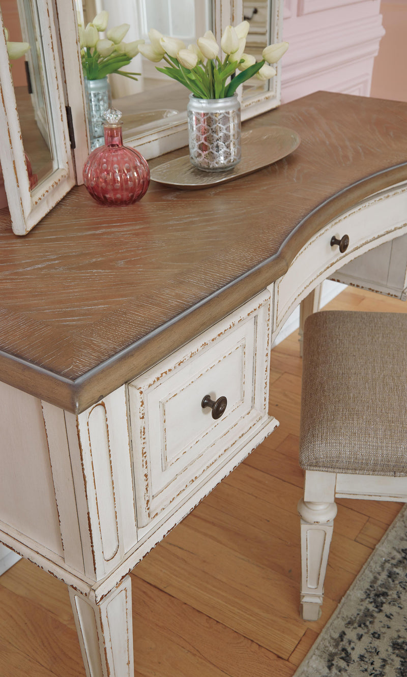 Realyn Two-tone Queen Upholstery Panel Bed, Dresser, Chest, Nightstand, and Vanity Set - B743B35