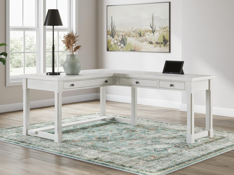Robbinsdale Antique White L-Shaped Home Office Desk - H742H1