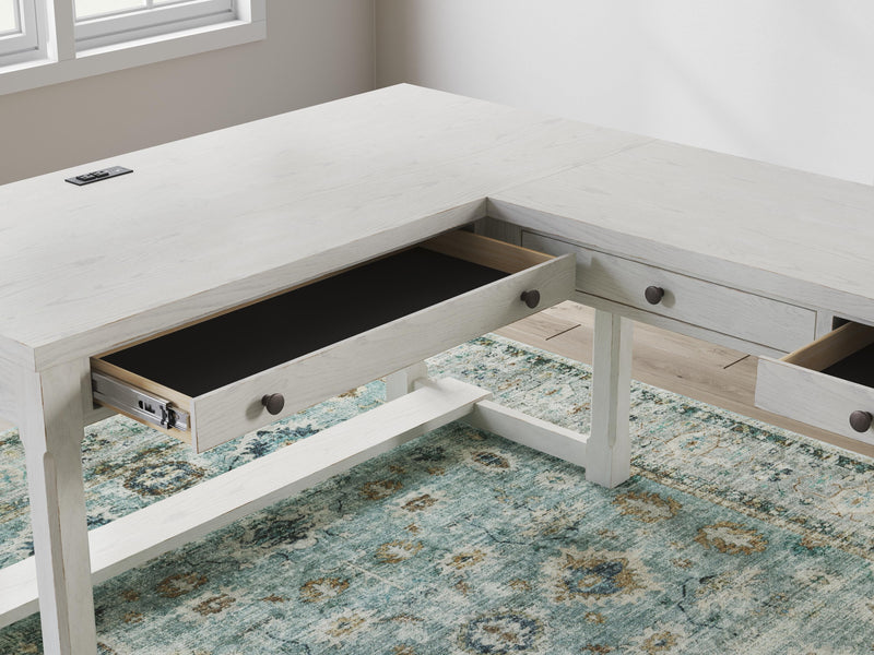 Robbinsdale Antique White L-Shaped Home Office Desk - H742H1