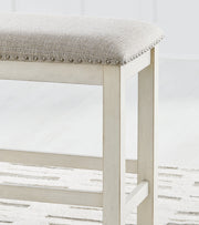 Robbinsdale Antique White Counter Height Dining Table and 6 Barstools and Bench with Storage from Ashley - Luna Furniture