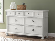 Rowlenstown King Poster Bed and Dresser in Antique White - PKG023872