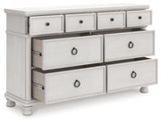 Rowlenstown Queen Poster Bed and Dresser in Antique White - PKG023867