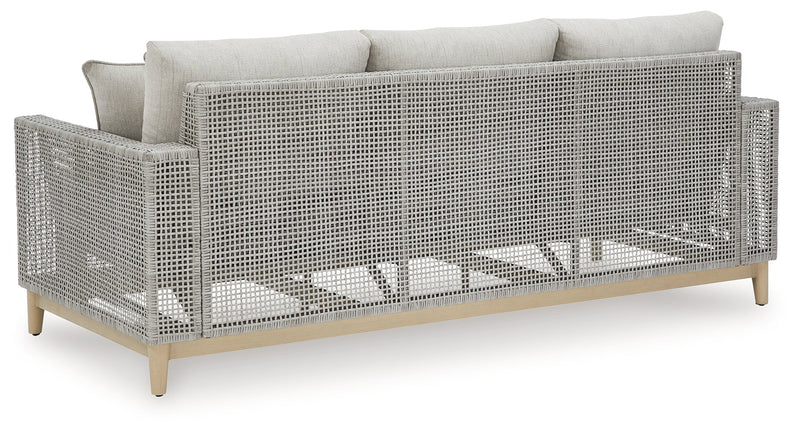 Seton Creek Outdoor Sofa and Loveseat with Coffee Table in Gray from Ashley - Luna Furniture