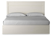 Stelsie White King Panel Bed, Dresser, Mirror and Nightstand - B2588B17
