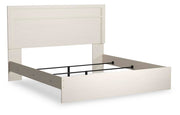Stelsie White King Panel Bed, Dresser, Mirror and Nightstand - B2588B17