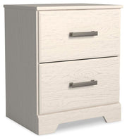 Stelsie White King Panel Bed, Dresser, Mirror and Nightstand - B2588B17