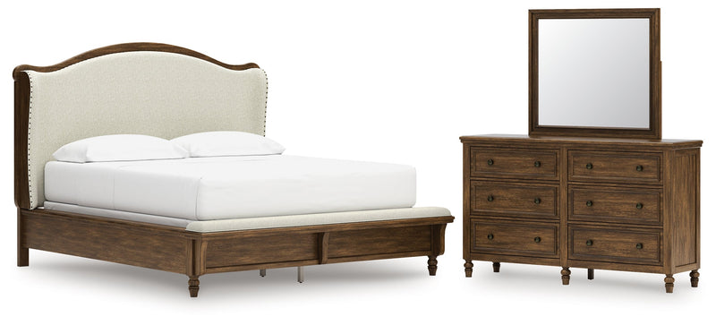 Sturlayne California King Upholstered Panel Bed with Mirrored Dresser in Brown from Ashley - Luna Furniture