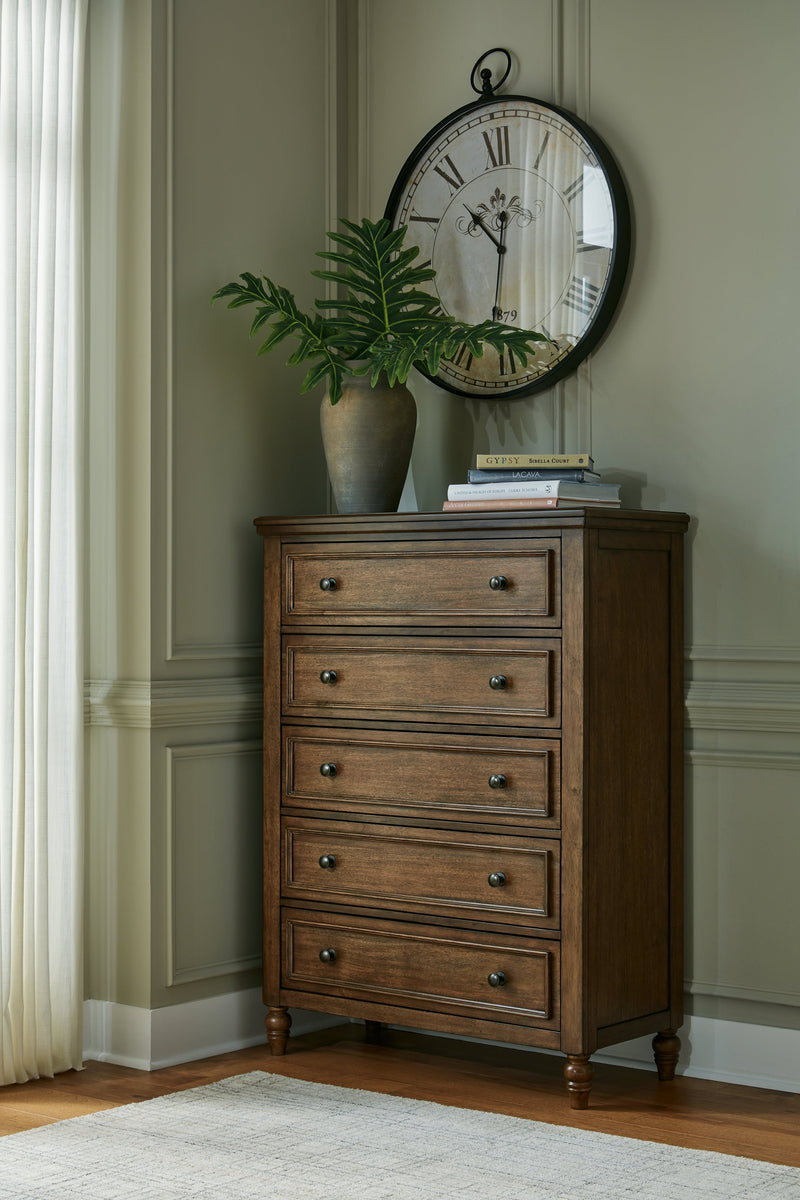 Sturlayne King Upholstered Panel Bed with Mirrored Dresser and Chest in Brown from Ashley - Luna Furniture
